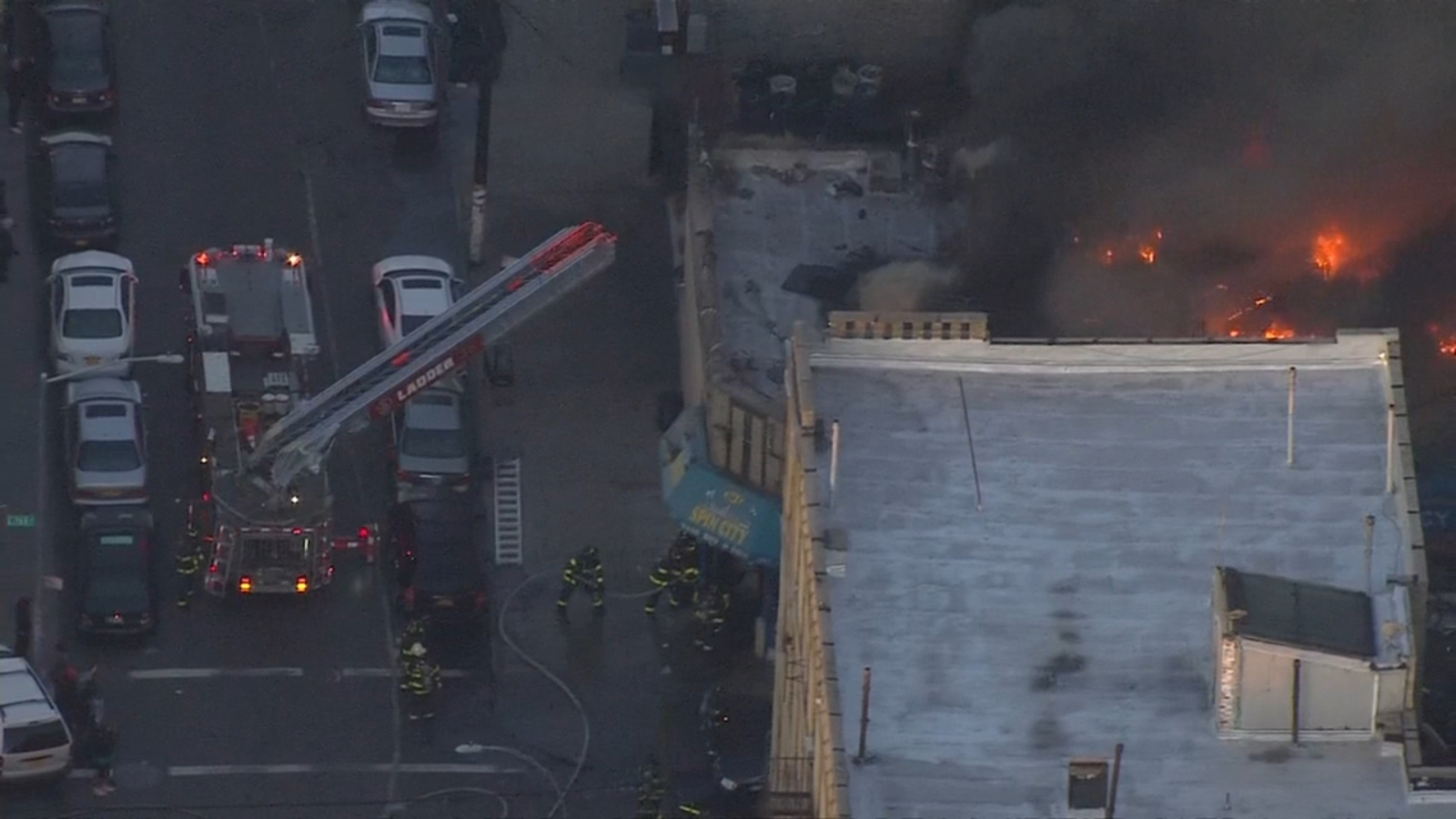 Fire burns through row of businesses in Fordham - ABC7 New York