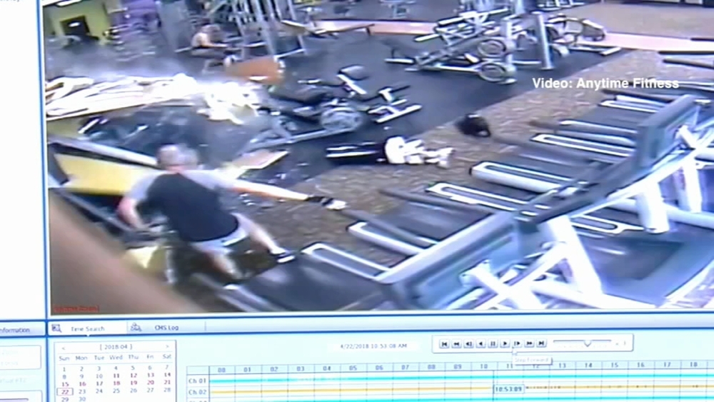 Man stepping off treadmill almost struck by Tesla