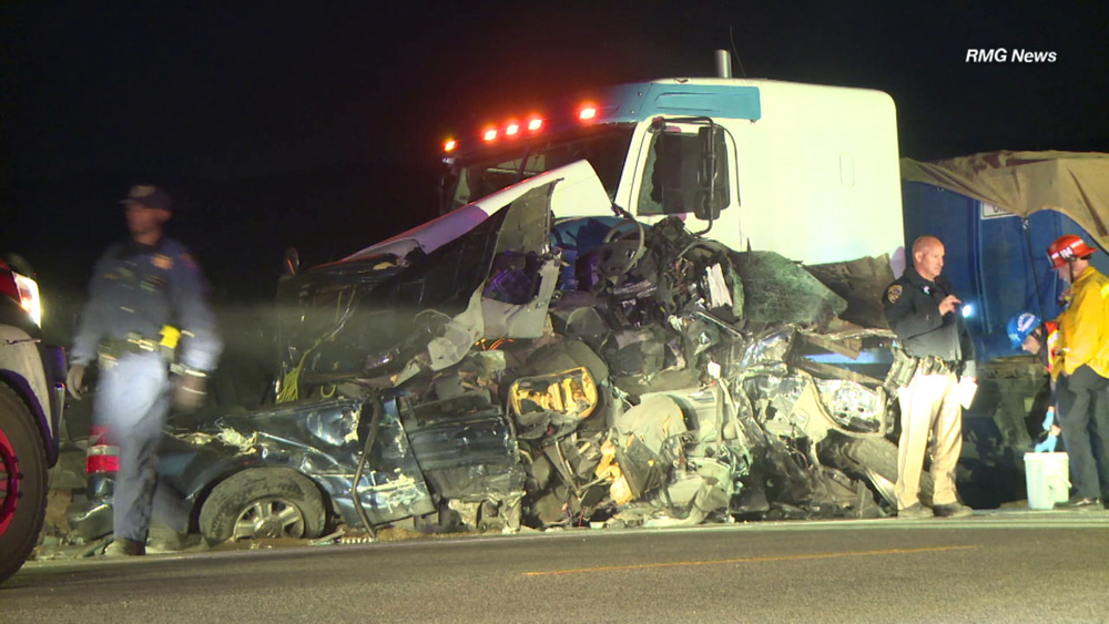 Driver in Llano crushed by big rigs as son came to his aide