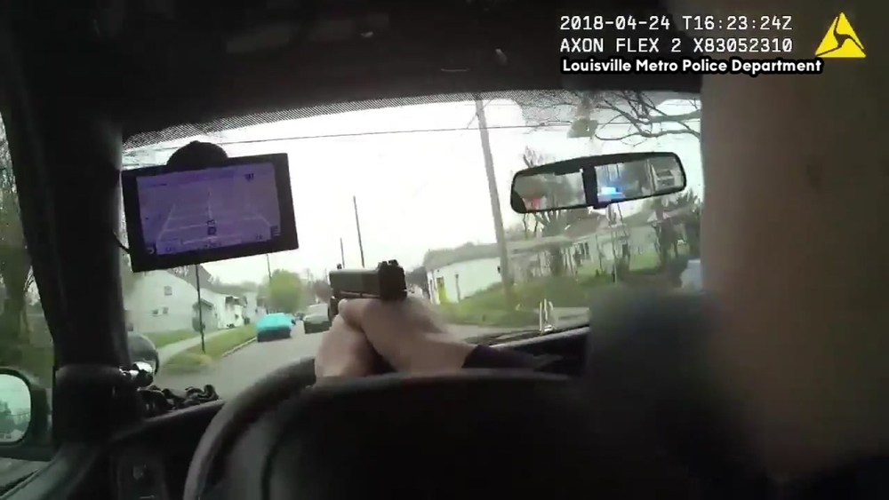 Louisville Police officer fires through windshield at suspect