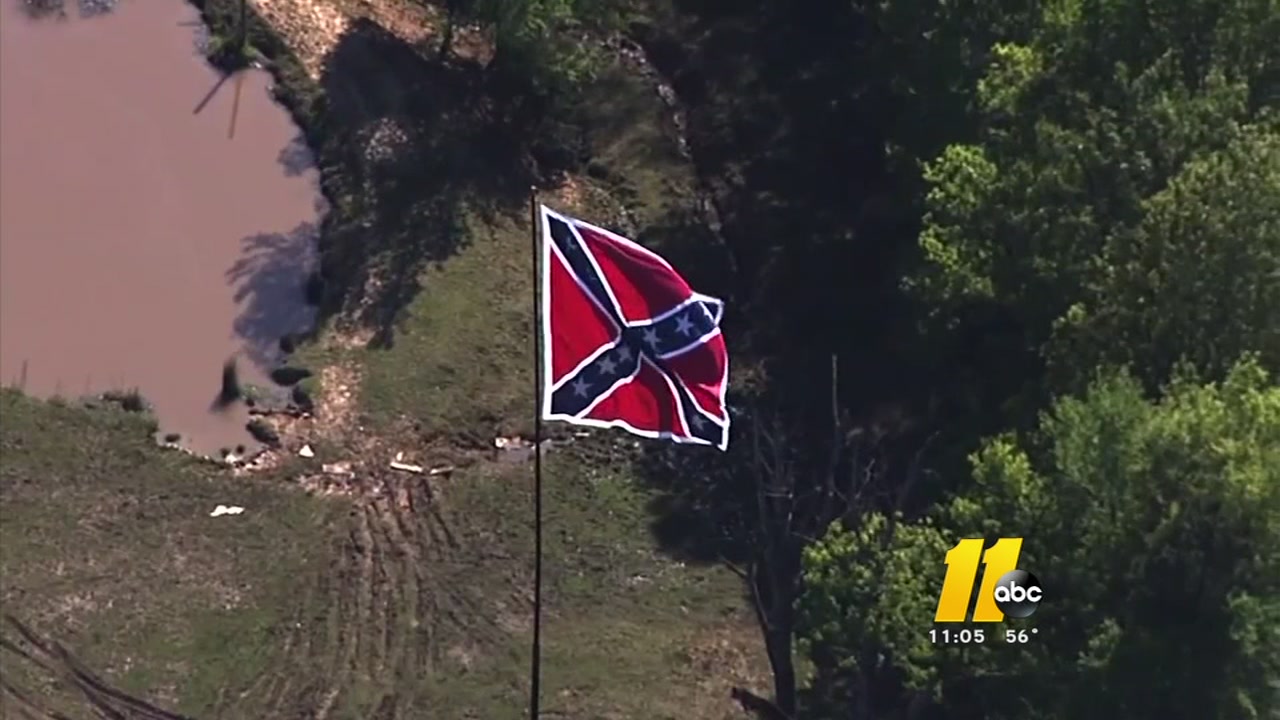 Dozens debate large Confederate flag in Orange County