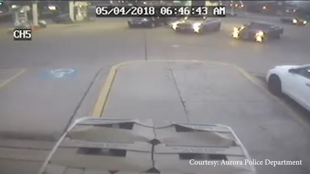 Aurora police release video of man stealing car with girl inside