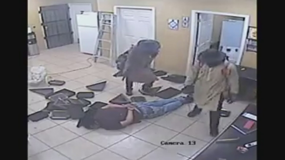 Surveillance video shows men attacking jewelry store owner