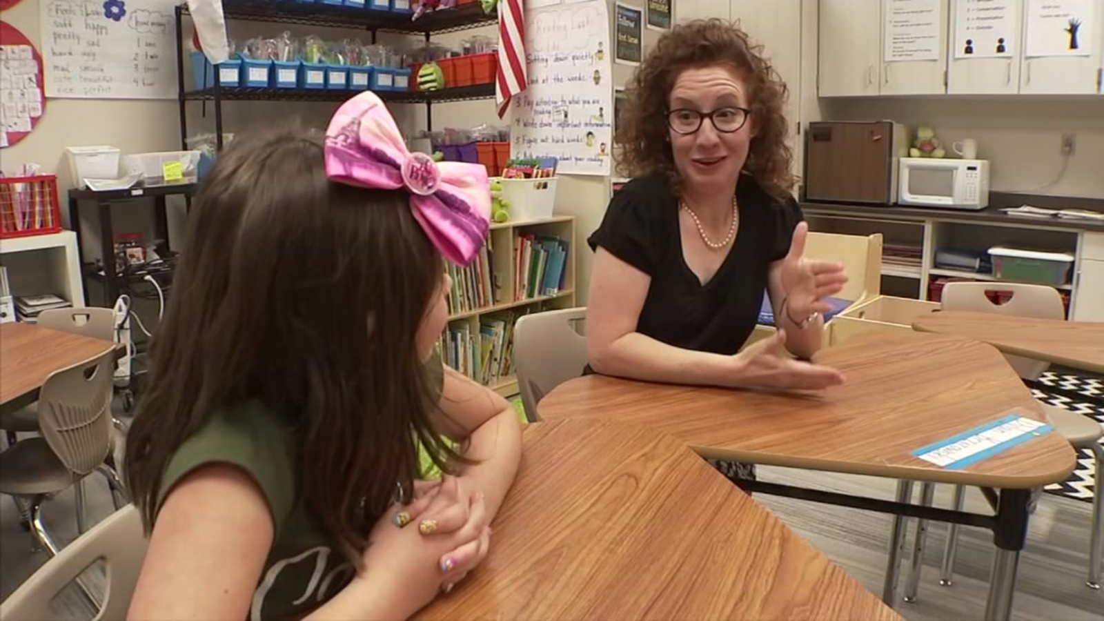 Firsthand lesson Teacher inspires deaf students with a lot of heart