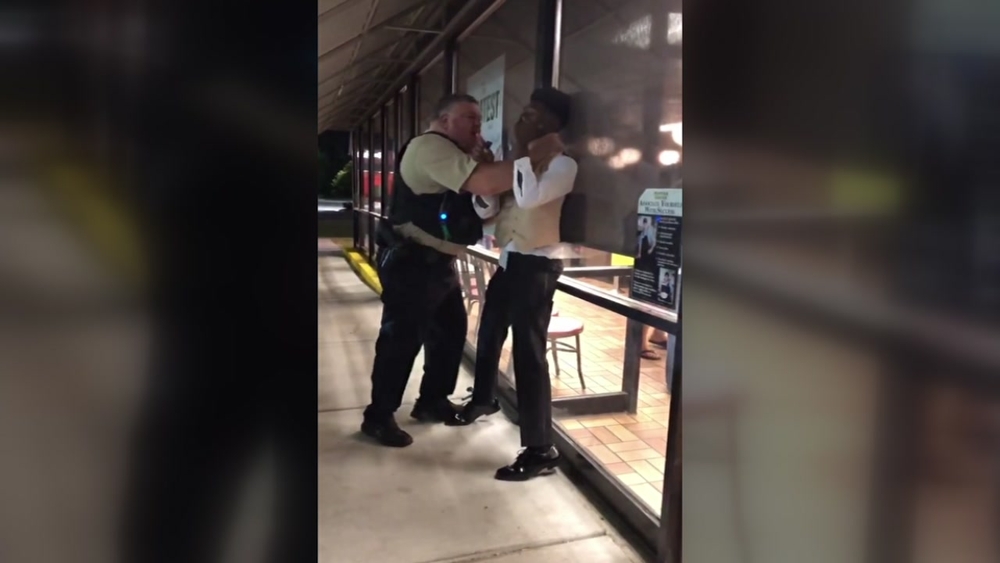 Police investigating after video shows officer putting man in chokehold outside Waffle House