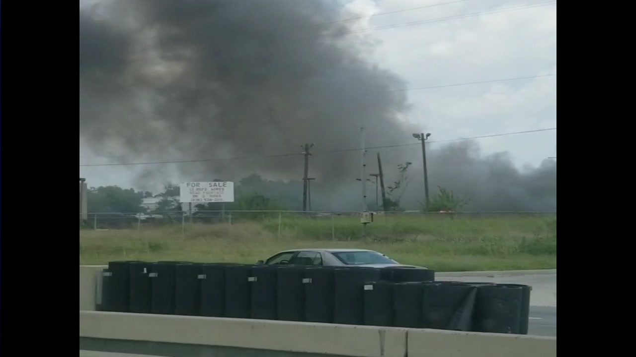 Massive fire breaks out at Husky Trailers on North Freeway