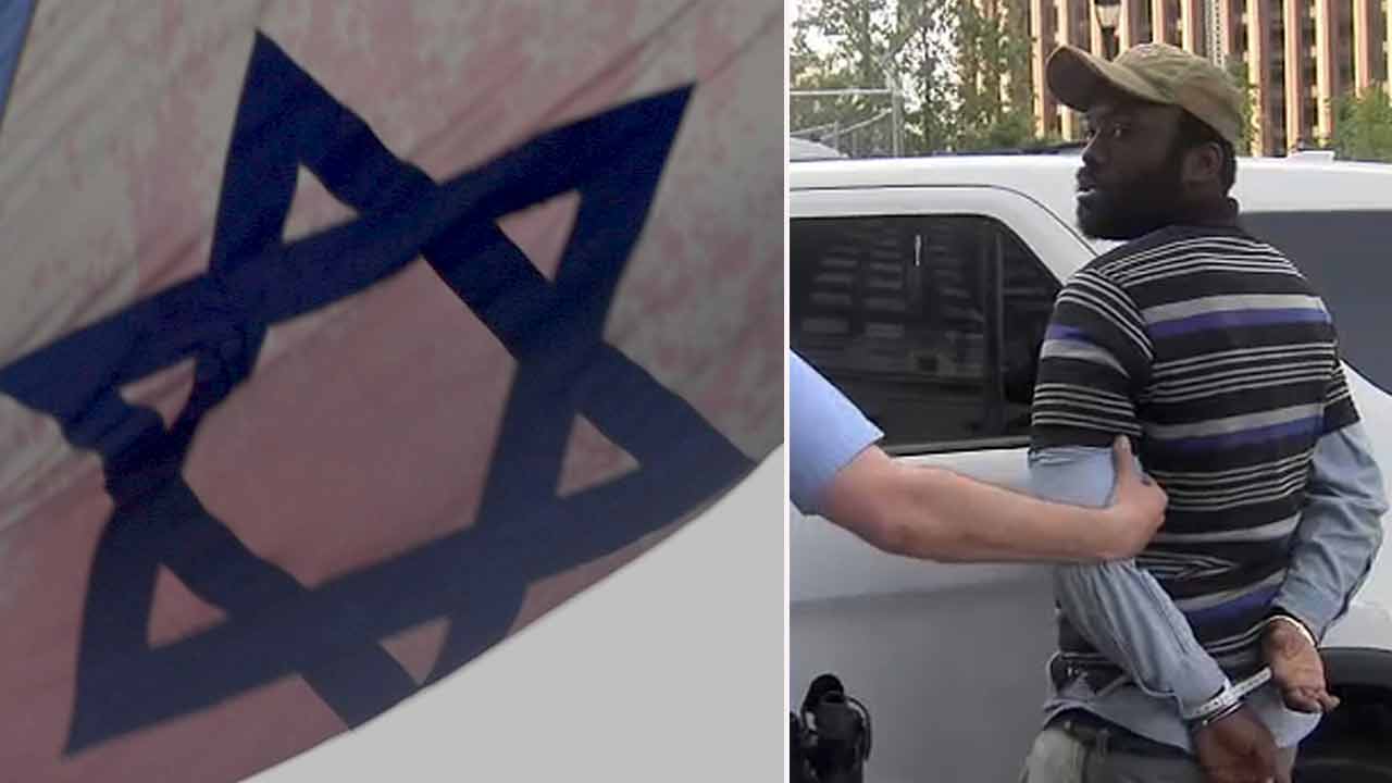Israeli flag on Parkway defaced with red paint