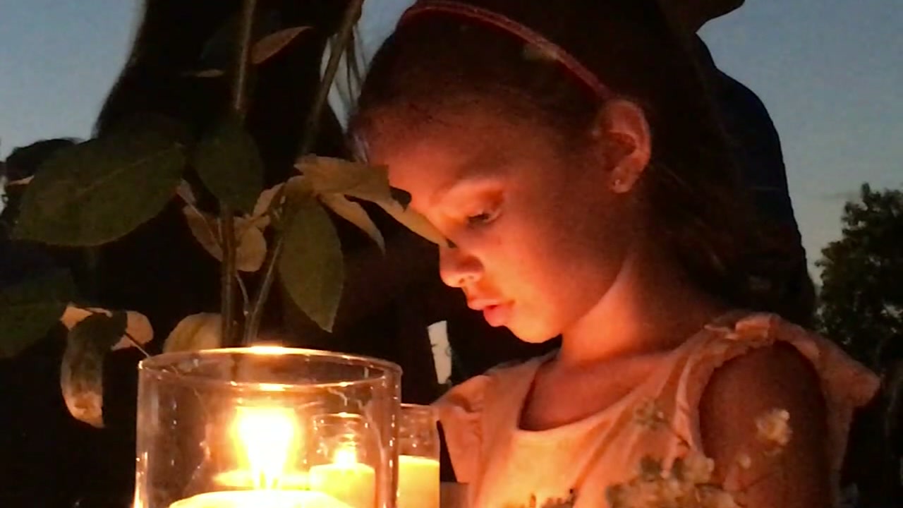 Town holds vigil to grieve for Santa Fe victims