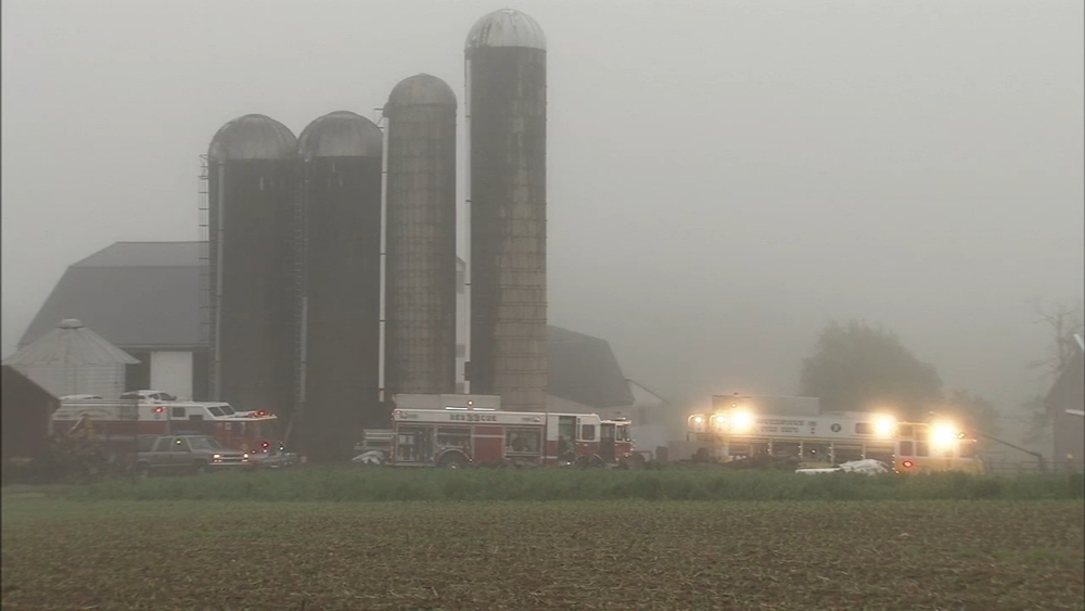 Boy rescued from manure pit