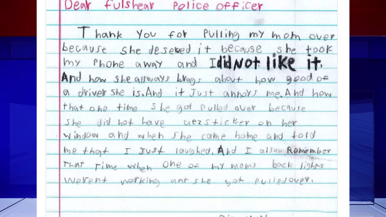 Kid thanks police officers for giving her mother a ticket