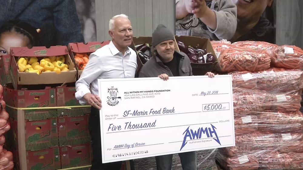Metallica rocks SF-Marin Food Bank, presents them with $5K check