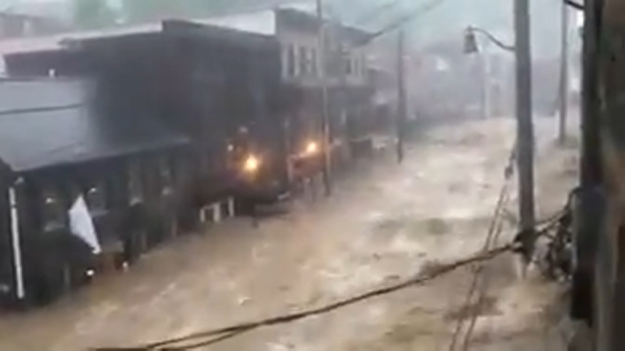 Flash flood surges through Maryland community