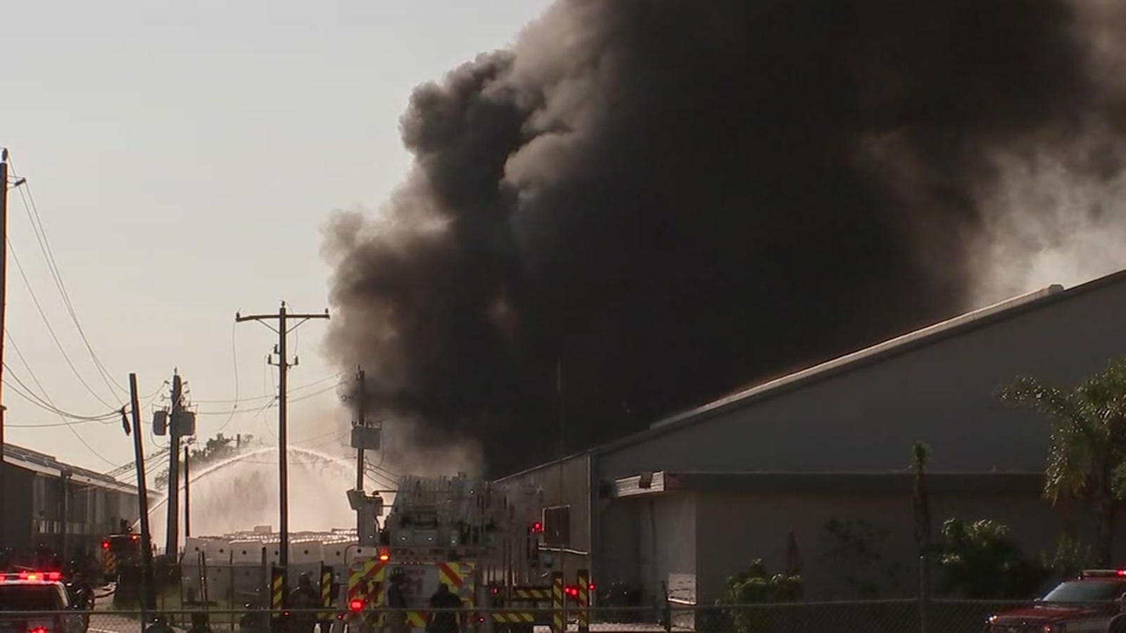 2 firefighters taken to hospital after 4alarm fire at warehouse in SW