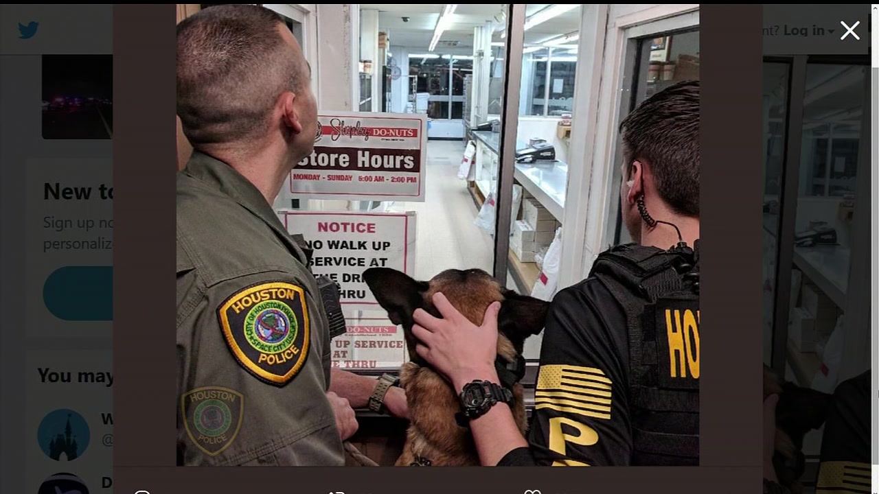 HPD officers and K9 anxiously wait for Shipley's to open for National Donut Day