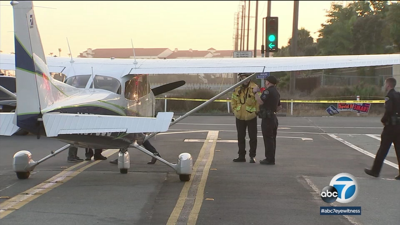 Small aircraft lands on street in Huntington Beach