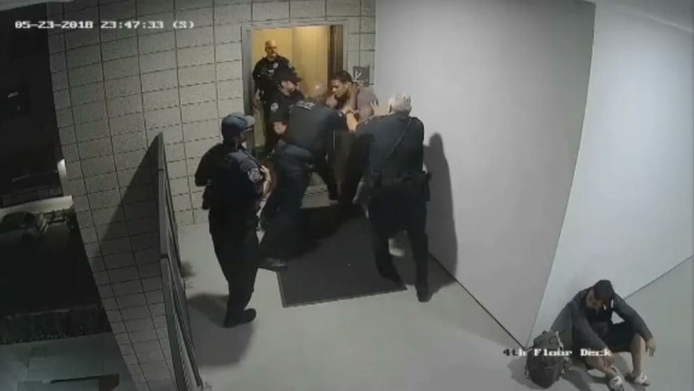 Video shows police violently beat a man who they say refused to sit down.