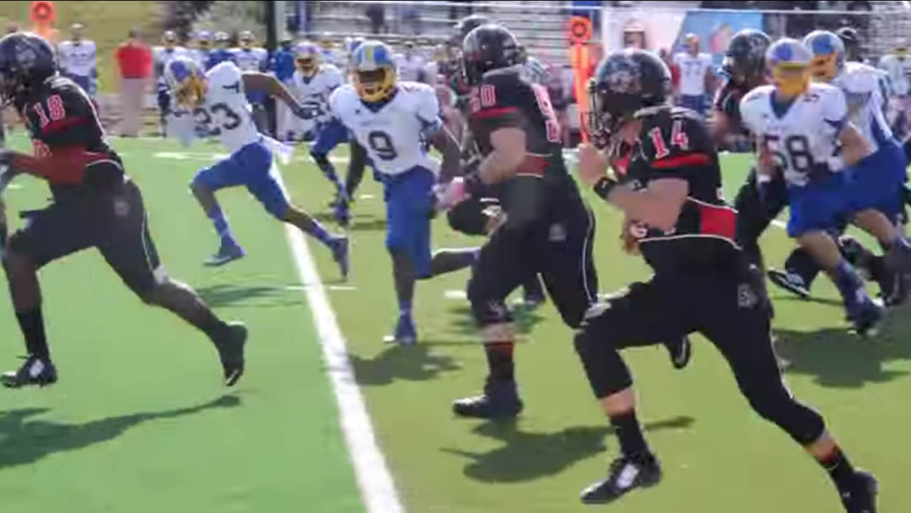 CRAZY SPORTS VIDEO Quarterback catches his own pass, runs for a