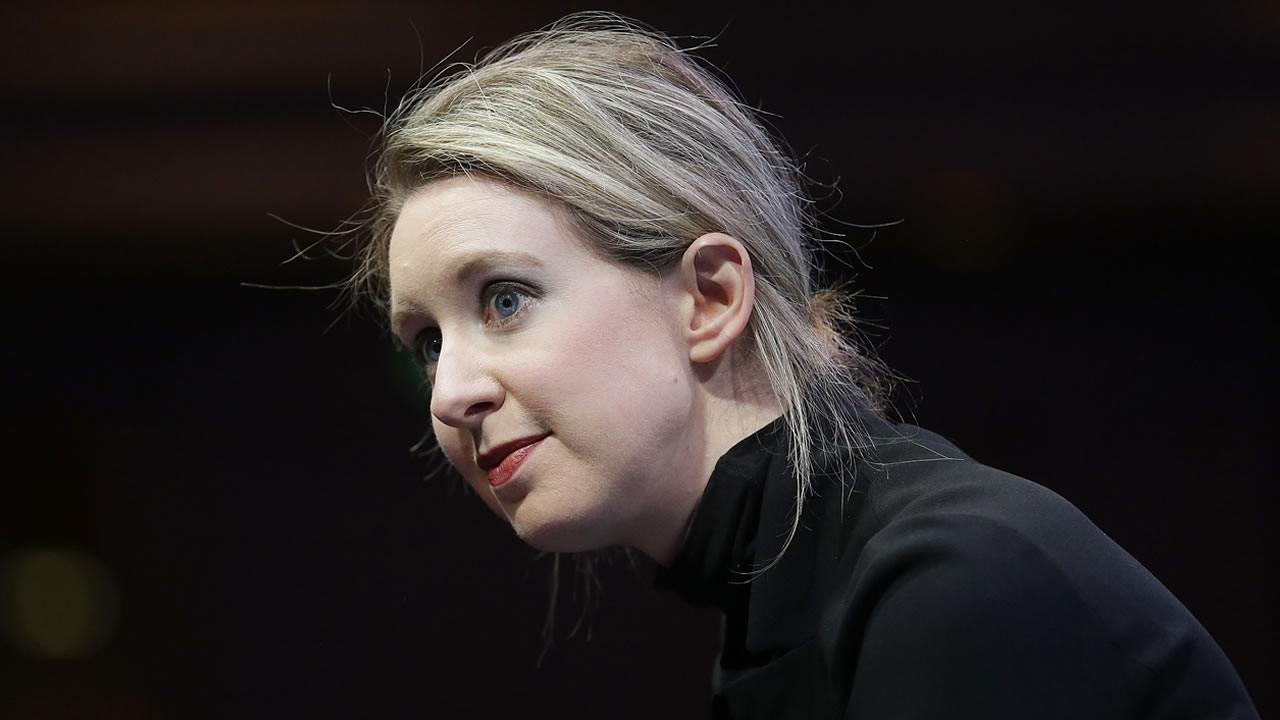Theranos founder, former president indicted on wire fraud charges