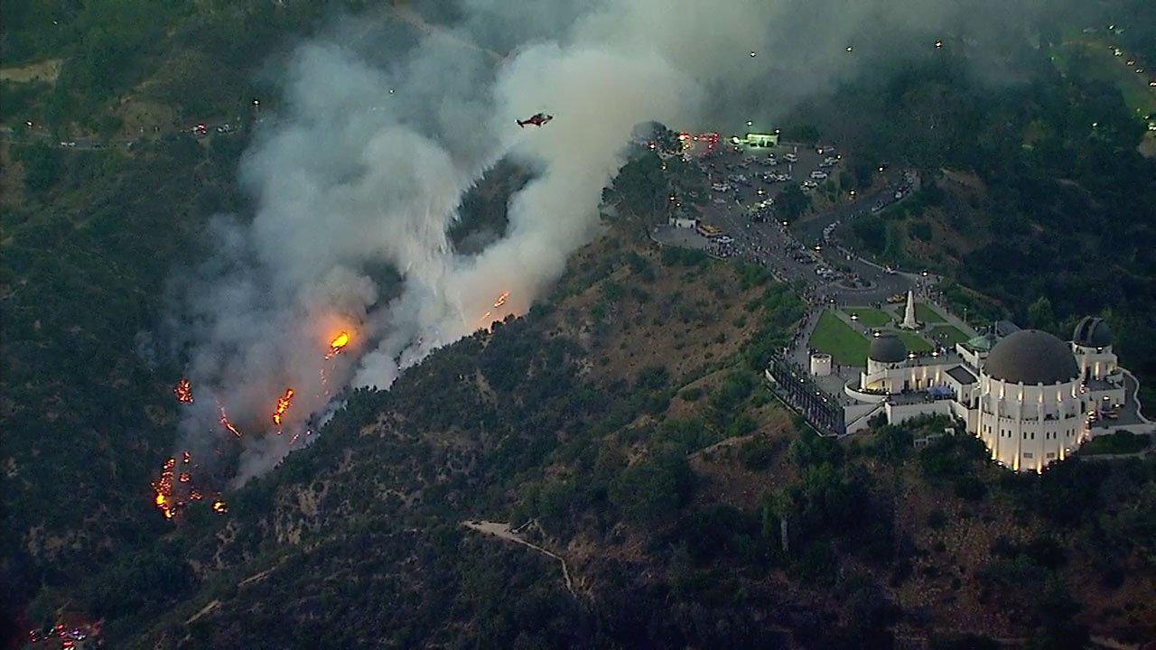Small brush fire burns up hillside near Griffith Observatory
