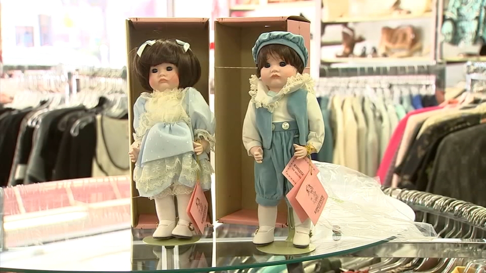 Thrift shop alerts couple of money in doll box
