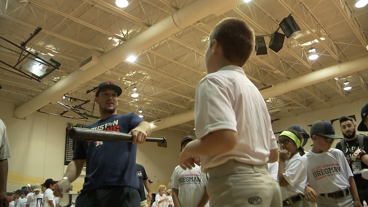 Alex Bregman gives baseball tips at Fort Bend Christian Academy.