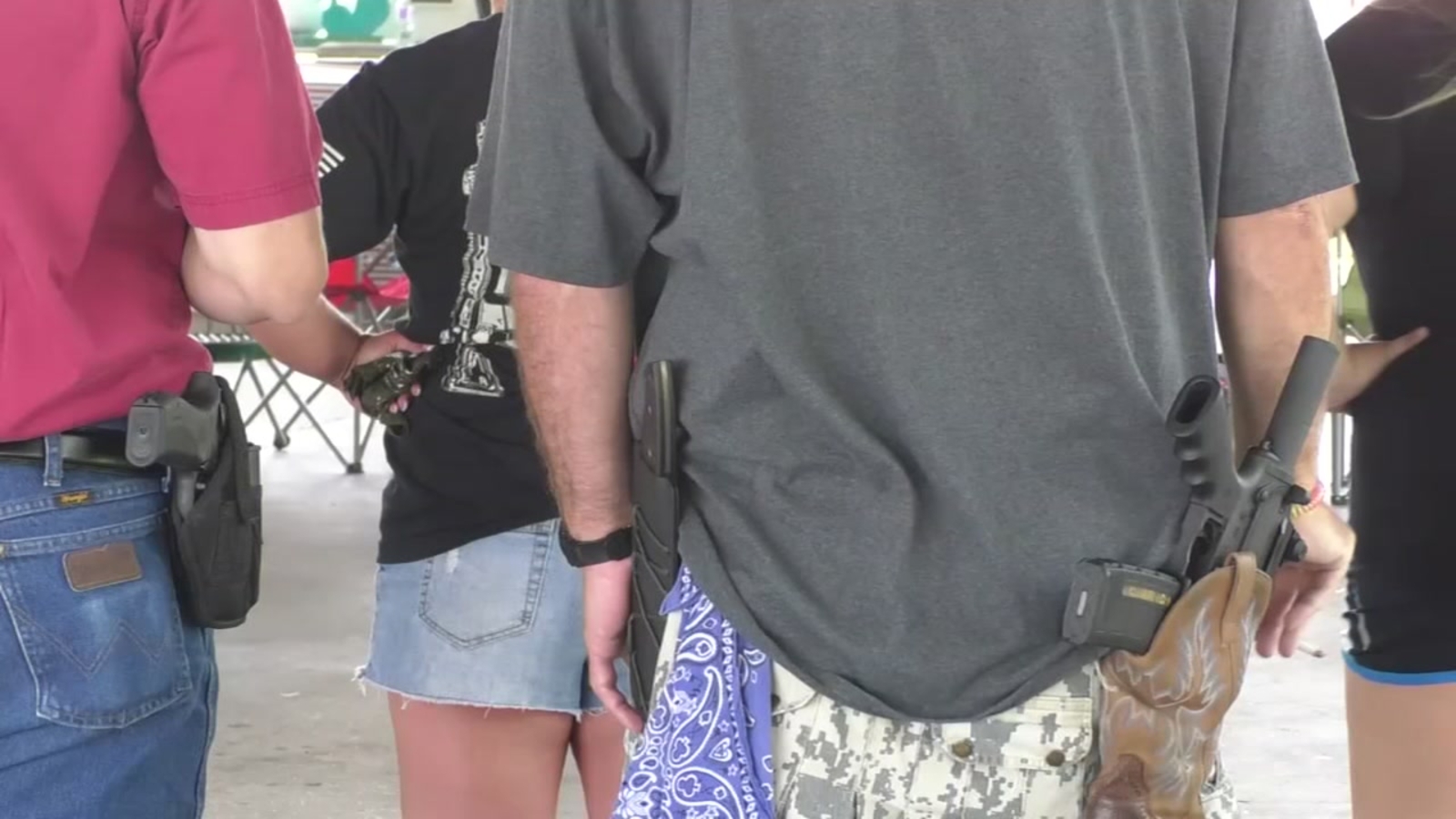 Gun owners call for teachers to carry weapon on campuses during rally