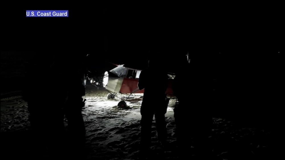 Search for pilot after plane lands on secured beach