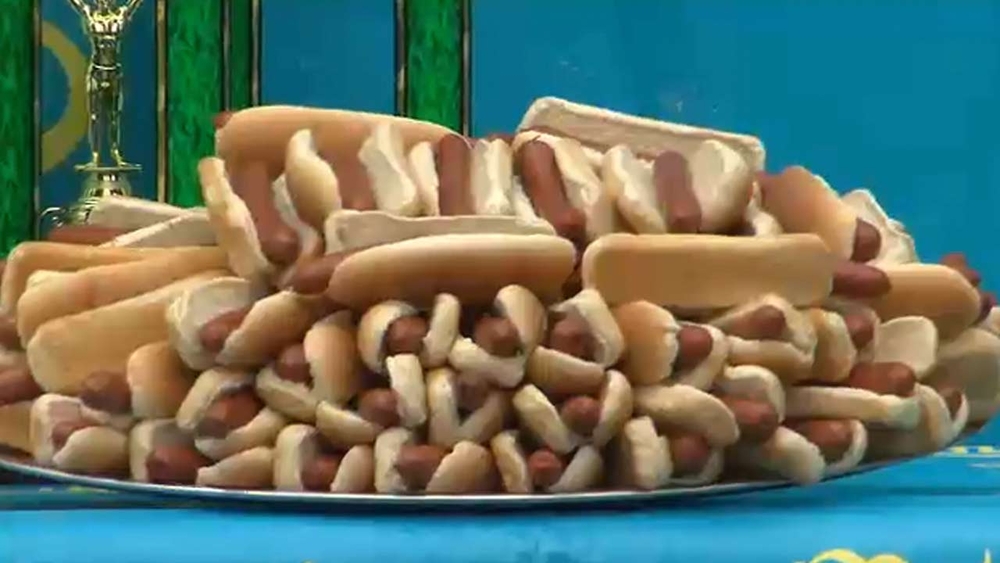 Mom and daughter competing together in the Nathan's Famous Hot Dog Eating Contest