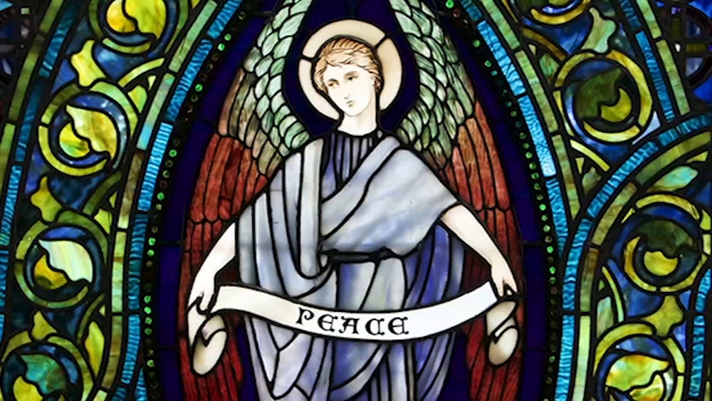 Restored Tiffany stained glass re-installed in Chicago church