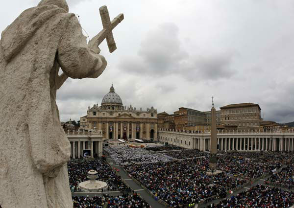 Faithful fill St. Peter's Square at the Vatican, Sunday, April 27, 2014. Pope Francis has declared his two predecessors John XXIII and John Paul II saints in an unprecedented canonization ceremony made even more historic by the presence of retired Pope Benedict XVI.(AP Photo/Alessandra Tarantino)