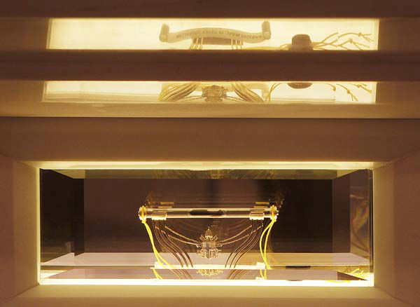 The relics of Pope John Paul II _a vial of his blood _ built into a marble altar of a new sanctuary dedicated to the pontiff in Krakow, Poland, Sunday, April 27, 2014, the day when Pope Francis declared Polish-born John Paul II a saint. Thousands of people gathered in the sanctuary to watch live the Vatican ceremony. (AP Photo/Czarek Sokolowski)