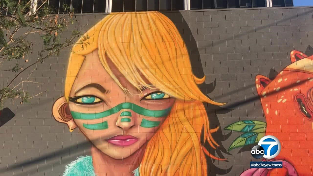 Long Beach neighborhood brings in street artist for mural