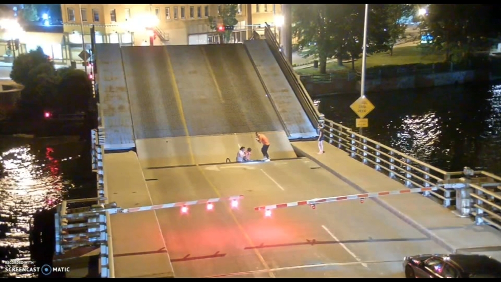 Bicyclist falls in drawbridge opening
