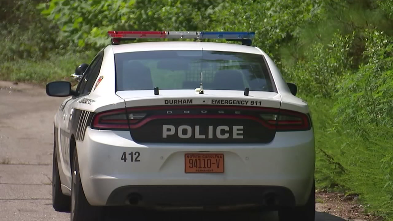 Durham Police investigate after dead body found in burned car