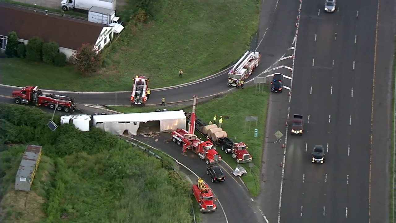 Truck carrying paper towels overturns