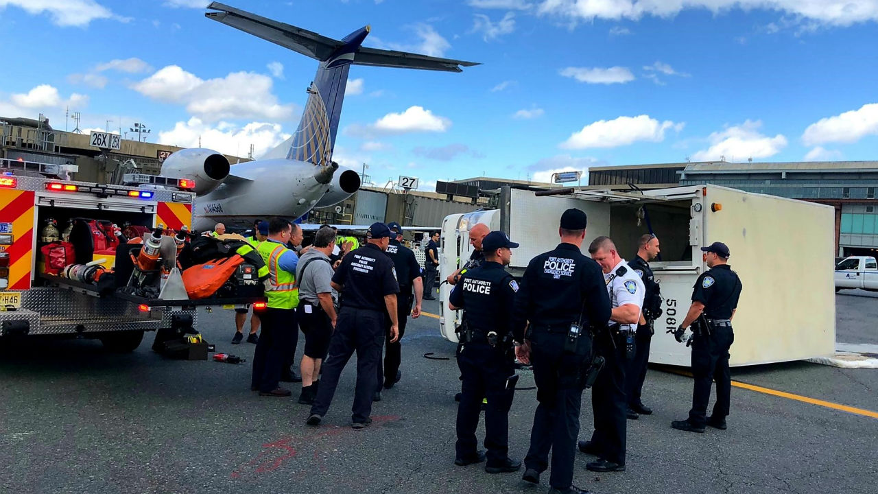 Woman injured when plane backs into catering truck at Newark airport