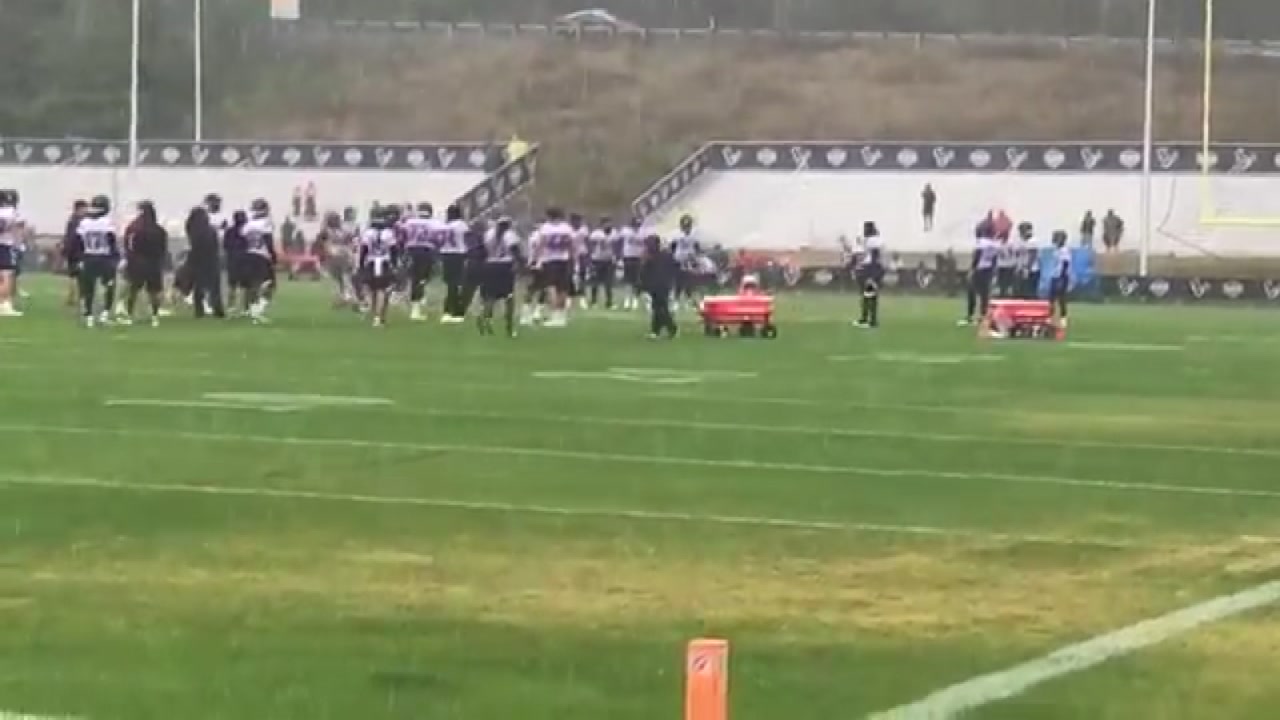 Texans dancing in the rain