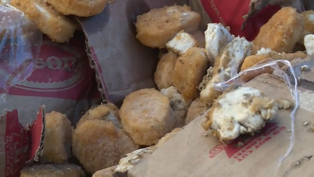 Train-truck collision scatters frozen chicken nuggets for blocks