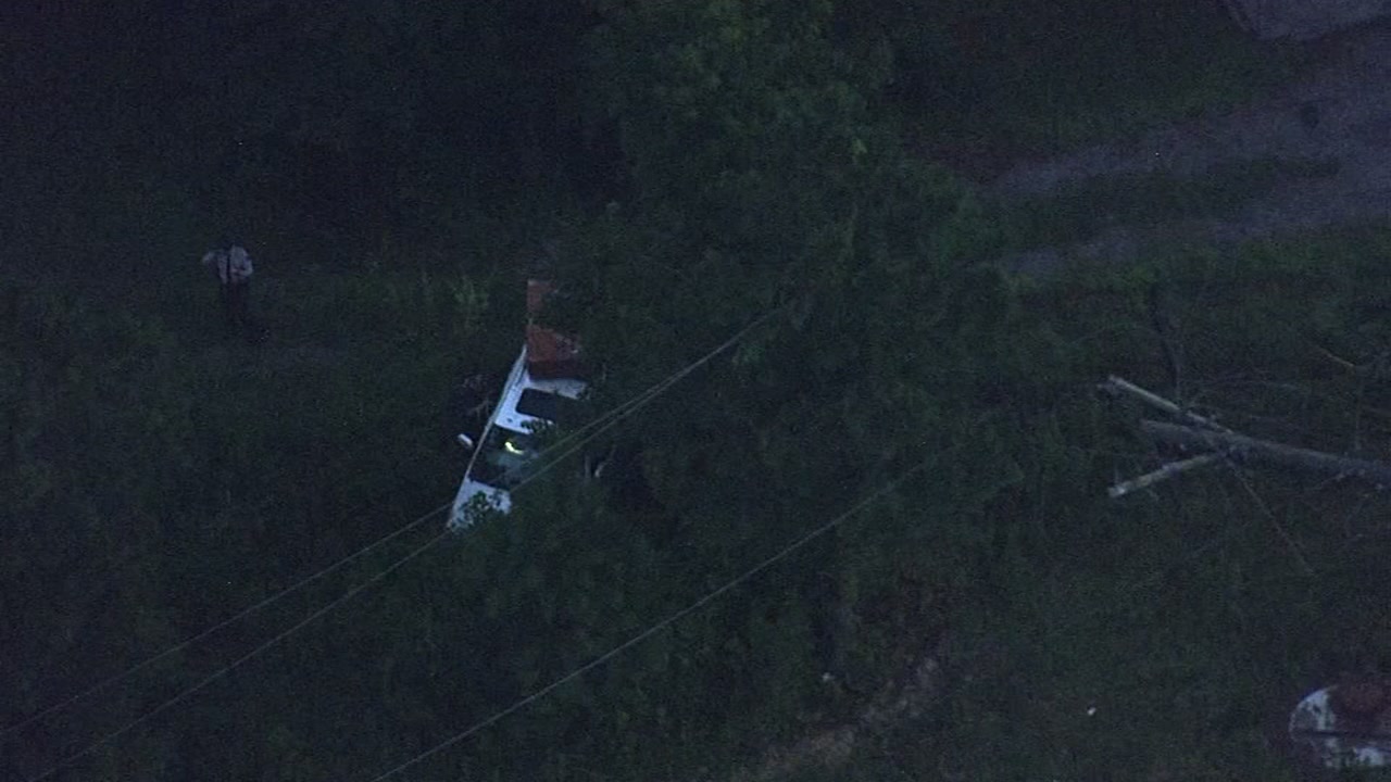 Driver looking at GPS knocks down power lines on I-95 in Johnston County