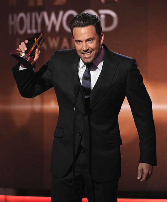 Ben Affleck accepts the Hollywood film award for "Gone Girl" on stage at the Hollywood Film Awards at the Palladium on Friday, Nov. 14, 2014, in Los Angeles.