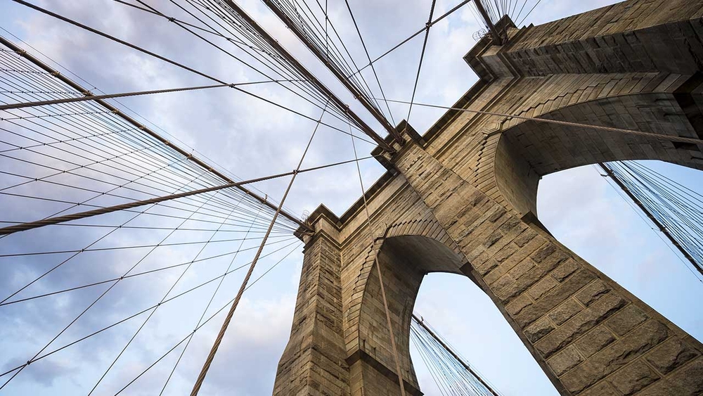 How do bridges withstand extreme weather?