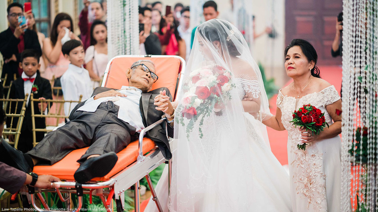 Ailing father still manages to 'walk' daughter down aisle