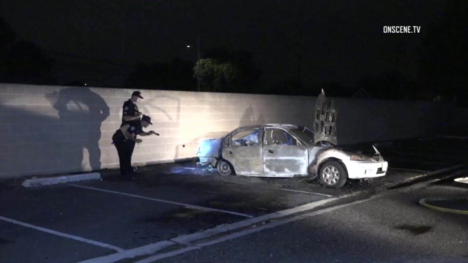 2 arrested in death of Orange County man found in burned car near ...