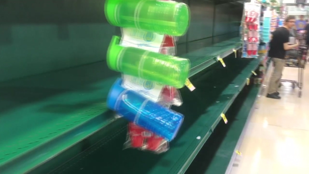 Long lines, empty shelves at Triangle stores