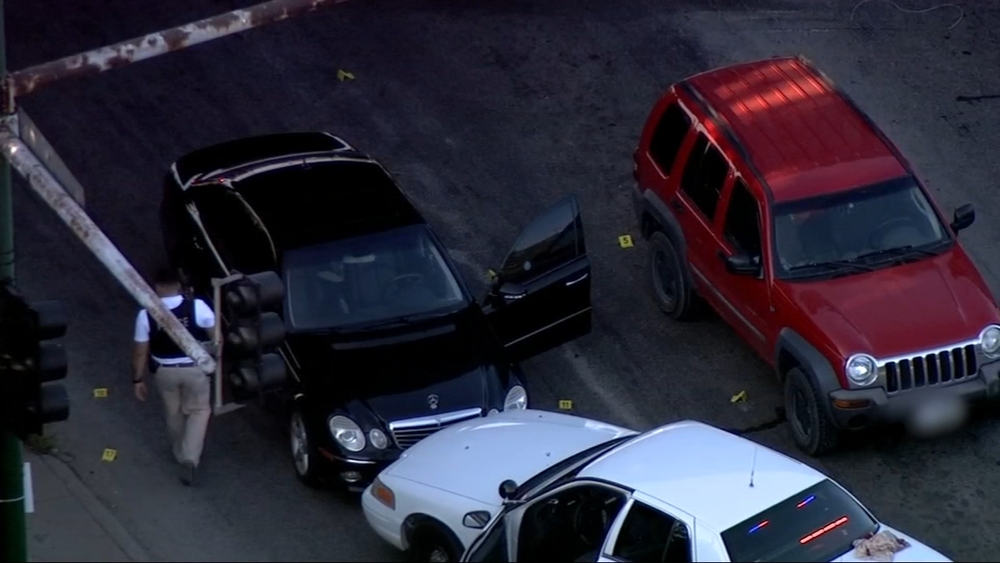 Local man shoots gunman who shot officer
