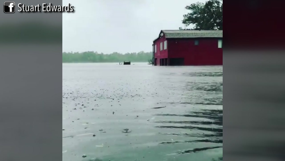 VIDEO: Man wades through nearly chest-high Florence floodwaters