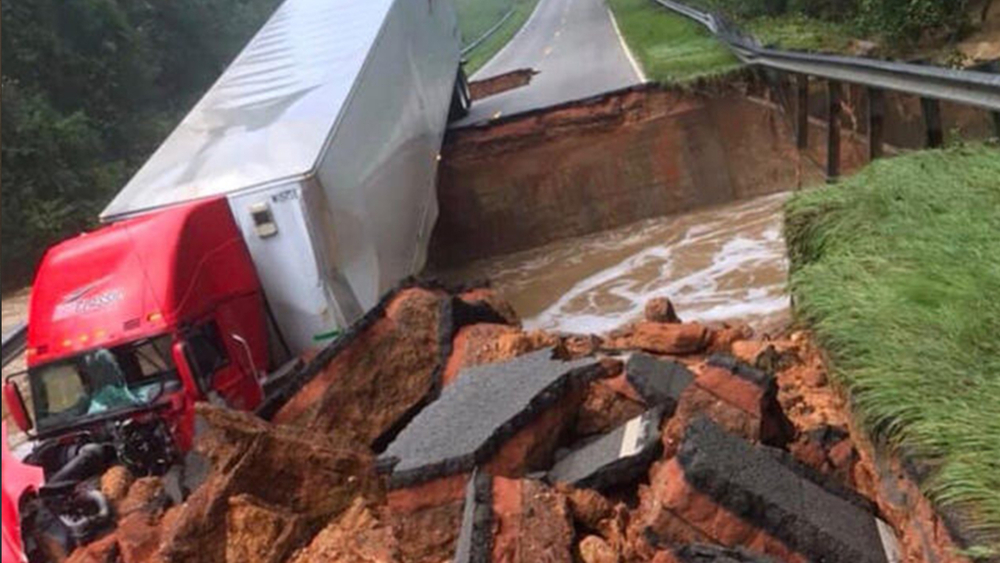Bridge gives out under big rig during Florence flooding