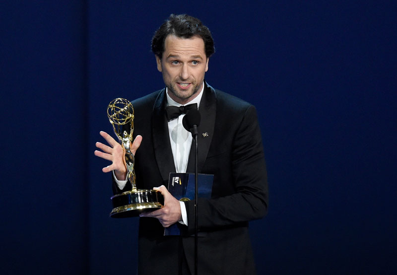 Matthew Rhys accepts the award for outstanding lead actor in a drama series for "The Americans" at the 70th Primetime Emmy Awards.