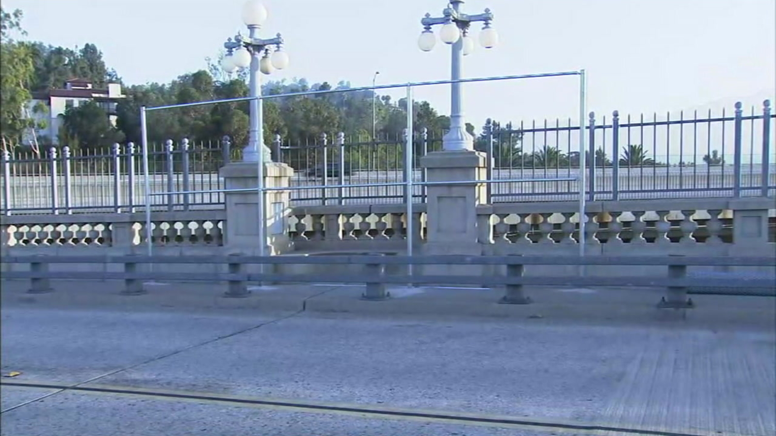 Suicide barriers to temporarily cover entire span of ...