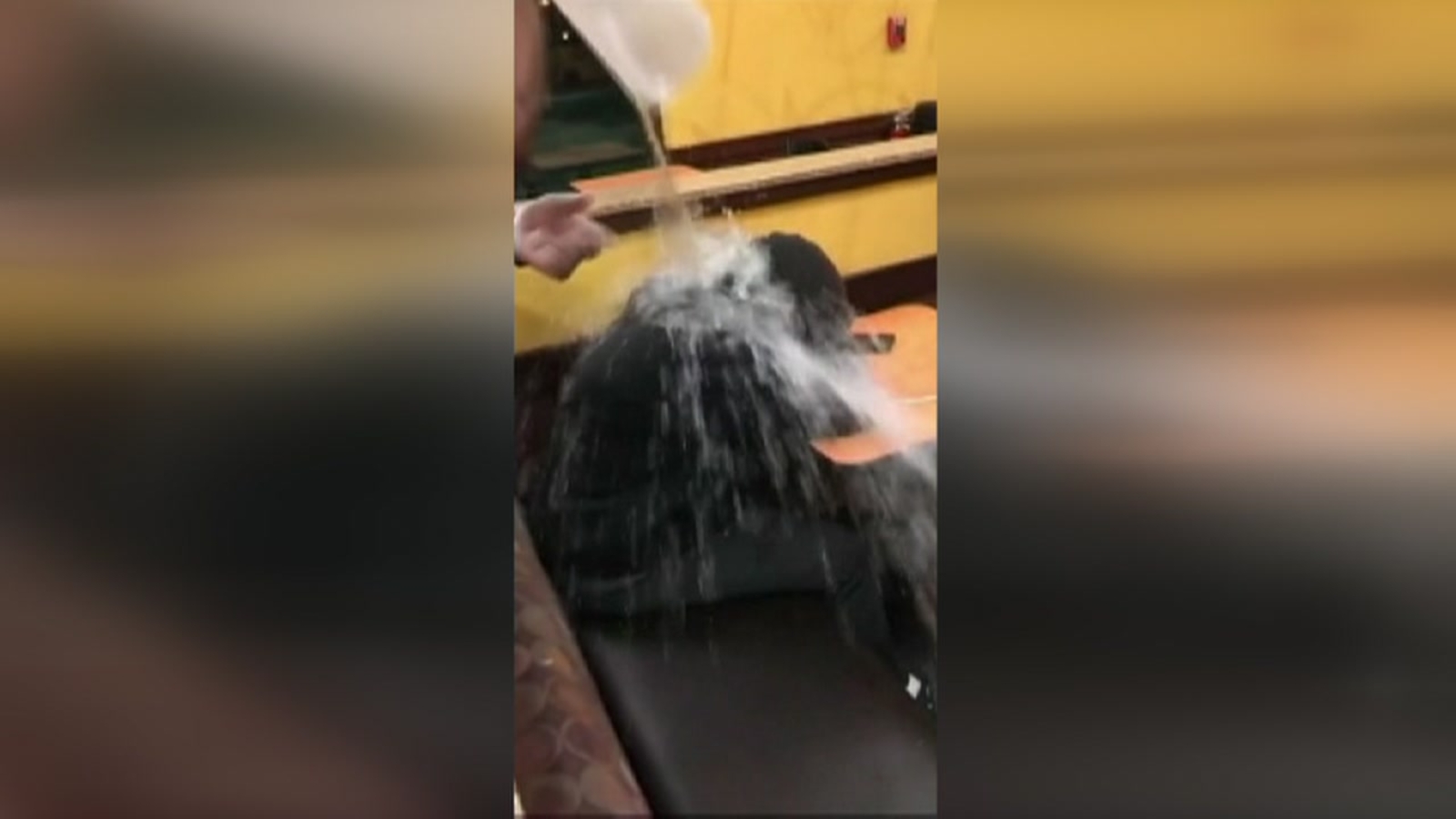 Dunkin' Donuts fires workers who poured water on homeless man ABC13